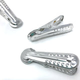 Set of three Japanese aluminum clothes pegs featuring a decorative wave cutout design, ideal for hanging laundry or multipurpose household use