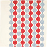 Flat lay of Yumeji Takehisa’s Tsunagi Dango furoshiki cloth featuring repeating red and grey dango pattern on a cream background, traditional Japanese textile design.