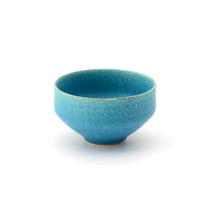 Handmade Shigaraki matcha bowl in vibrant azure blue glaze, crafted in Japan for tea ceremonies and everyday elegance.