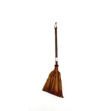 Traditional Japanese Shuro angle broom made with durable palm fibers and a polished natural bamboo handle, designed for precise sweeping in corners and along baseboards. Handcrafted by artisans using age-old techniques, this eco-friendly broom blends functionality with minimalist aesthetic and is ideal for daily household use.