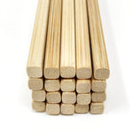 Close-up view of premium Japanese bamboo chopsticks arranged vertically, showing the smooth, square-cut ends and tight grain pattern — highlighting the craftsmanship and natural texture of sustainably sourced bamboo used in traditional Japanese dining. 