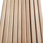 Close-up view of natural bamboo chopsticks highlighting the fine grain, smooth texture, and squared edges — showcasing craftsmanship and eco-conscious design typical of traditional Japanese utensils.