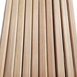 Close-up view of natural bamboo chopsticks highlighting the fine grain, smooth texture, and squared edges — showcasing craftsmanship and eco-conscious design typical of traditional Japanese utensils.