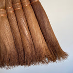 close-up of the bristles of a handcrafted Japanese Shuro angle broom, showcasing the natural texture and fine detail of the palm fibers bound with copper wire. The tightly bundled bristles are soft yet sturdy, ideal for sweeping dust and debris without scratching floors